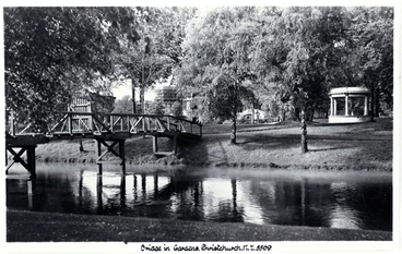 Image: Woodland bridge in Christchurch Botanic Gardens : on the right is the Bandsmens Memorial rotunda.