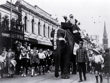 Image: A Christmas parade passes along Colombo Street, Christchurch