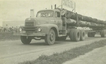 Image: Egmont Box Company, Limited. A New Zealand Forest Products truck in Tokoroa procession, 1950s to 1960s