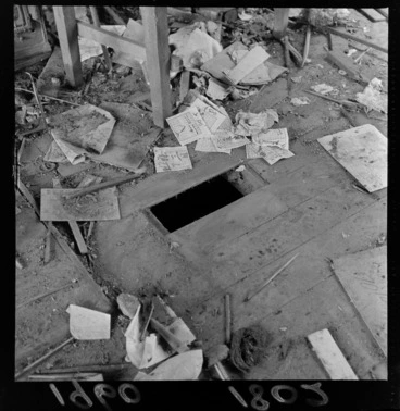 Image: Interior of a building for demolition, in Haining Street, Wellington, showing floor littered with Chinese ephemera