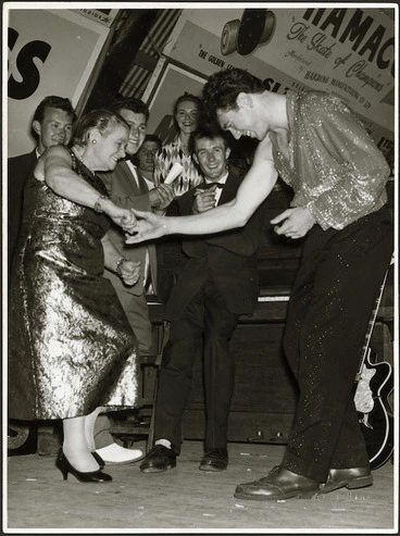 Image: Dame Mabel Howard jiving with singer Johnny Devlin - Photograph taken by Green and Hahn