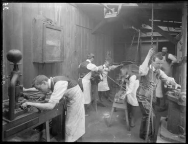 Image: Workers in the workshop of the Automatic Stamping Company