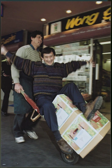 Image: Sik Lowe Young and Ray Wong She outside fruiterers Wong She & Sons, Lambton Quay, Wellington - Photograph taken by Ross Giblin