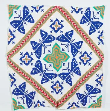 Image: Tīvaevae ta’ōrei pepe (patch work quilt with butterfly pattern)