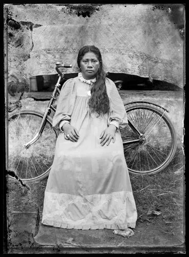Image: Woman with a bicycle