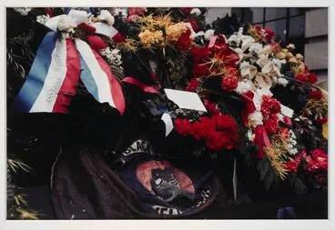 Image: Denis O'Reilly's Black Power jacket and wreaths on coffin of Norman Kirk