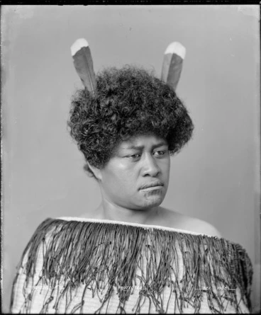 Image: Maori woman wearing korowai and huia feathers