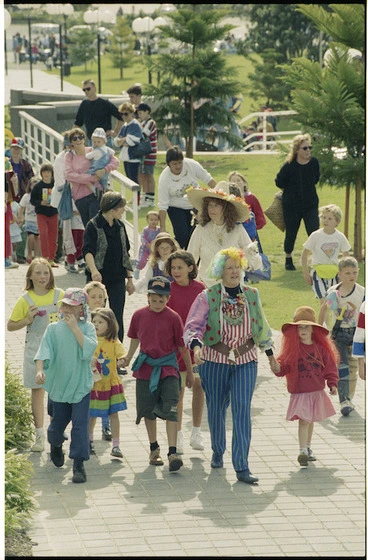 Image: Author Margaret Mahy leads a group of children through Frank Kitts Park, Wellington - Photograph taken by Phil Reid