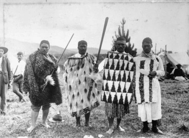 Image: Ross, Malcolm, 1862-1930 :Young men of Tuhoe land, in flax and feather mats