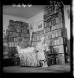 Mrs V Markham-Jones, reading in a private library, Wellington