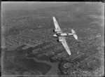 Royal New Zealand Air Force Airspeed Oxford aeroplane in flight over Auckland