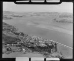 View of Saint Leonards, Roseneath, Dunedin City, with residential housing and farmland and Burkes Drive, looking north to Port Chalmers and Otago Peninsula and Heads beyond