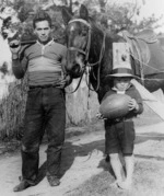 George Nepia with his son on their farm at Rangitukia