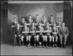 Studio portrait of a men's hockey team with their cup, probably Christchurch region