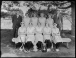 Unidentified members of women's hockey team with their mascot and cup, probably Christchurch region