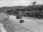 Truck, motorcycle and sidecar with Johnsonville in the background