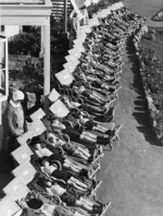 Row of young boys sunbathing at a sanatorium, Cashmere, Christchurch