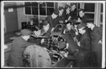 NZ pilots inspect a Spitfire, Canada