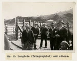 Mr C Langdale, telegraphist, and others, Waitangi wharf, Chatham Islands
