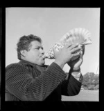 Carlos Moreno, Mexican Wrestler blowing into a large shell