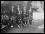 Woodford House girl's tennis team in school uniforms, Havelock North, Hawke's Bay District