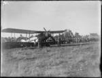Bristol fighter F2B biplane, probably Hastings district, showing large crowd in the background