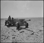 Jeep towing 6 pounder anti tank gun in El Alamein area, Egypt - Photograph taken by H Paton