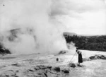 Woman taking a photograph of thermal activity