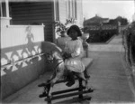Girl on a rocking horse