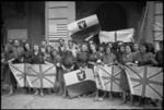 Italian women of newly libertated Massa Lombarda holding flags of Allied Nations, Italy, World War II - Photograph taken by George Kaye