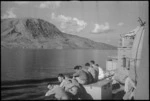 Crete veterans in NZ Division look at Suda Bay from deck of HMS Ajax - Photograph taken by J Murphy