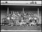 Unidentified members of the Methodist Church camp, standing in front of the grandstand, Tomoana, Hastings