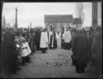 Large crowd and clergy gathered outside the Church of St John, Omahu, Hastings district