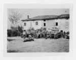 New Zealand tank crews, Italy, cleaning up after an advance - Photograph taken by W K Lloyd