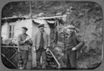 German prisoners of war outside a beach hut, Matiu/Somes Island, Wellington