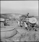 Water cart fills up at NZ water point on the Sangro River in Italy, World War II - Photograph taken by George Kaye