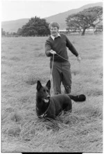 Policeman and dog in tracking excersize, Trentham - Photograph taken by Don Scott