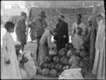 New Zealand soldiers buying melons in Cairo during World War II - Photograph taken by George Kaye