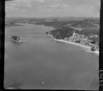 Paihia, Bay of Islands, includes wharf, shoreline, roads, housing, island and bush