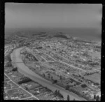 Gisborne, Poverty Bay, showing Taruheru River and housing, looking out towards Harbour