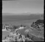 Taupo, includes view of lake, roads, waterway, boats, housing and Mt Ruapehu