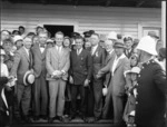 Creator unknown: Photograph of a group including Charles Kingsford Smith and John Stannage, Wigram Aerodrome, Christchurch