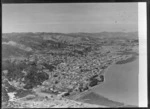 Thames coastal township with Queen Street State Highway 25 north and Victoria Park by beach front, Coromandel Peninsula, Waikato Region