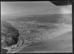 Petone township and beach with jetty foreground, with the Hutt Valley beyond