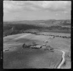 Tangiteroria, Northland, includes farmland, road and housing