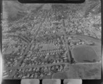 Nelson City and suburbs with greenhouses, the Maitai River and Trafalgar Park in foreground, Nelson Region