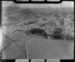 Nelson Harbour foreshore with groin and the Maitai River Estuary, with Nelson City and suburbs beyond, Nelson Region