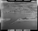 Entrance to the Port of Nelson Harbour with Boulder Bank and Haulashore Island in foreground, with port docks and industrial area and Nelson City beyond, Nelson Region