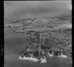 Beachlands, Auckland, includes housing, roads, township shoreline and farmland