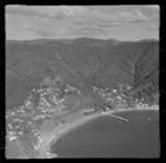 Days Bay with Marine Drive road, wharf and Wellington Harbour, Days Bay Pavilion and gardens, tennis courts and Wellesley College, Eastbourne, Wellington Region